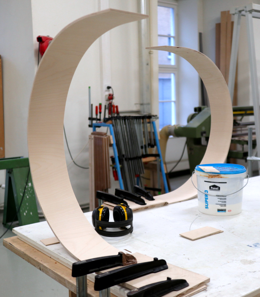 Two curved wood in the wood workshop.